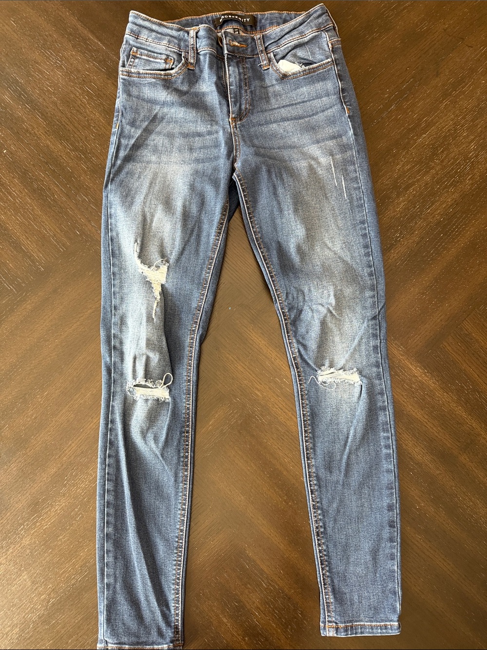 Women's Skinny Distressed Jeans in Medium Blue